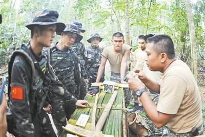 中马特种兵演习：靠3根火柴1把刀走出丛林（图）