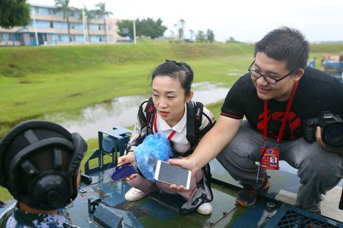 拼速度拼角度拼激情 记者编辑在路上──同心