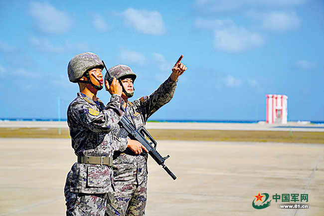 一部对讲机,联通海天哨位;一声声应答,守望万家灯火