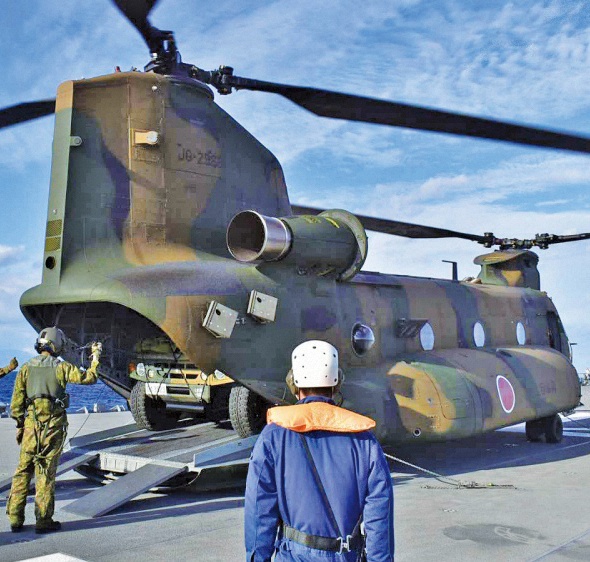 《中国国防报》推出整版报道 剖析日本近期军事危险动向